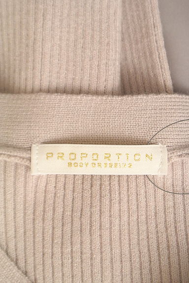 PROPORTION BODY DRESSING（プロポーションボディ ドレッシング）の古着「サテンペプラムニット＋ロングスカート（セットアップ（ジャケット＋スカート））」大画像６へ