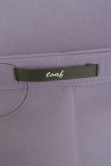 OSMOSIS(オズモーシス)シャツ買取実績のブランドタグ画像